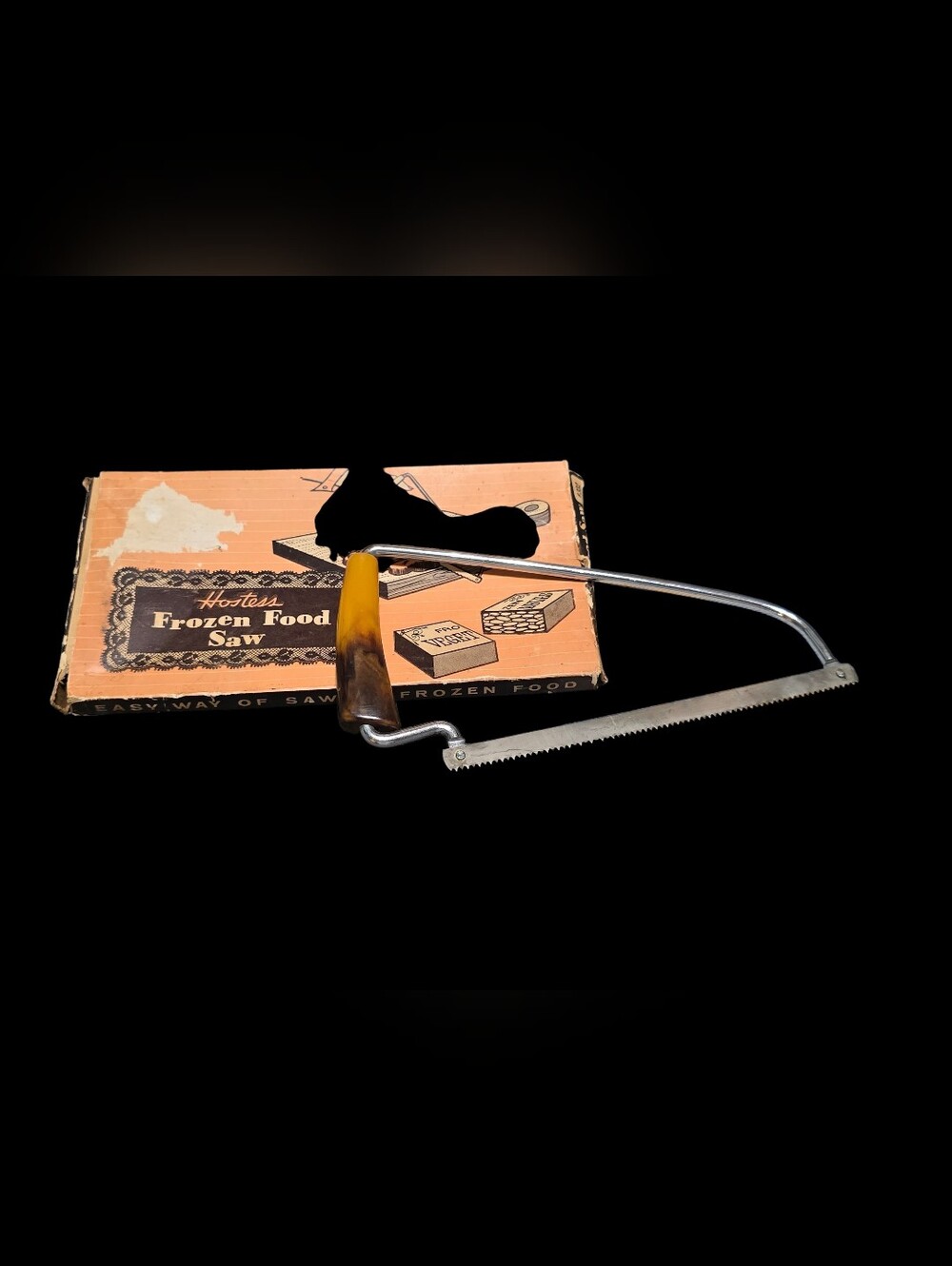 Vintage | Frozen Food Saw with Brown/Amber Handle